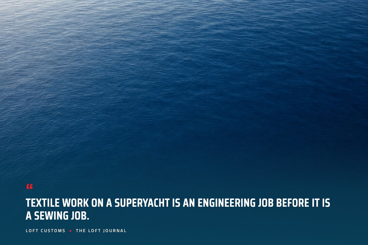 Pull quote over aerial ocean water: Textile work on a superyacht is an engineering job before it is a sewing job. Loft Customs, The Loft Journal